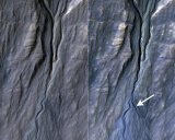 A camera on a NASA orbiter spotted a new channel formed on a Martian slope between 2010-2013. Image: NASA/California Institute of Technology/University of Arizona. 